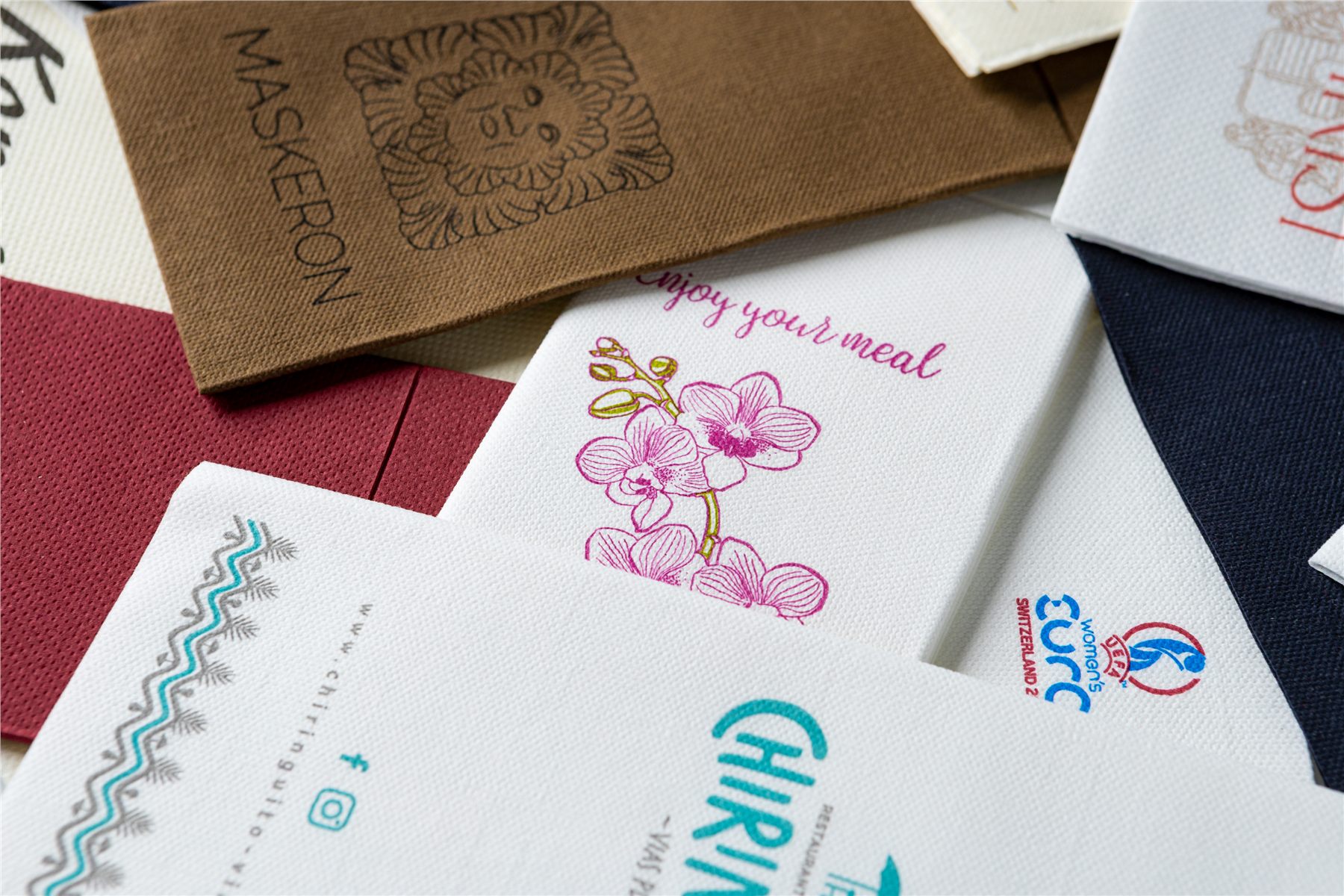 Close-up of personalized napkins in several colors