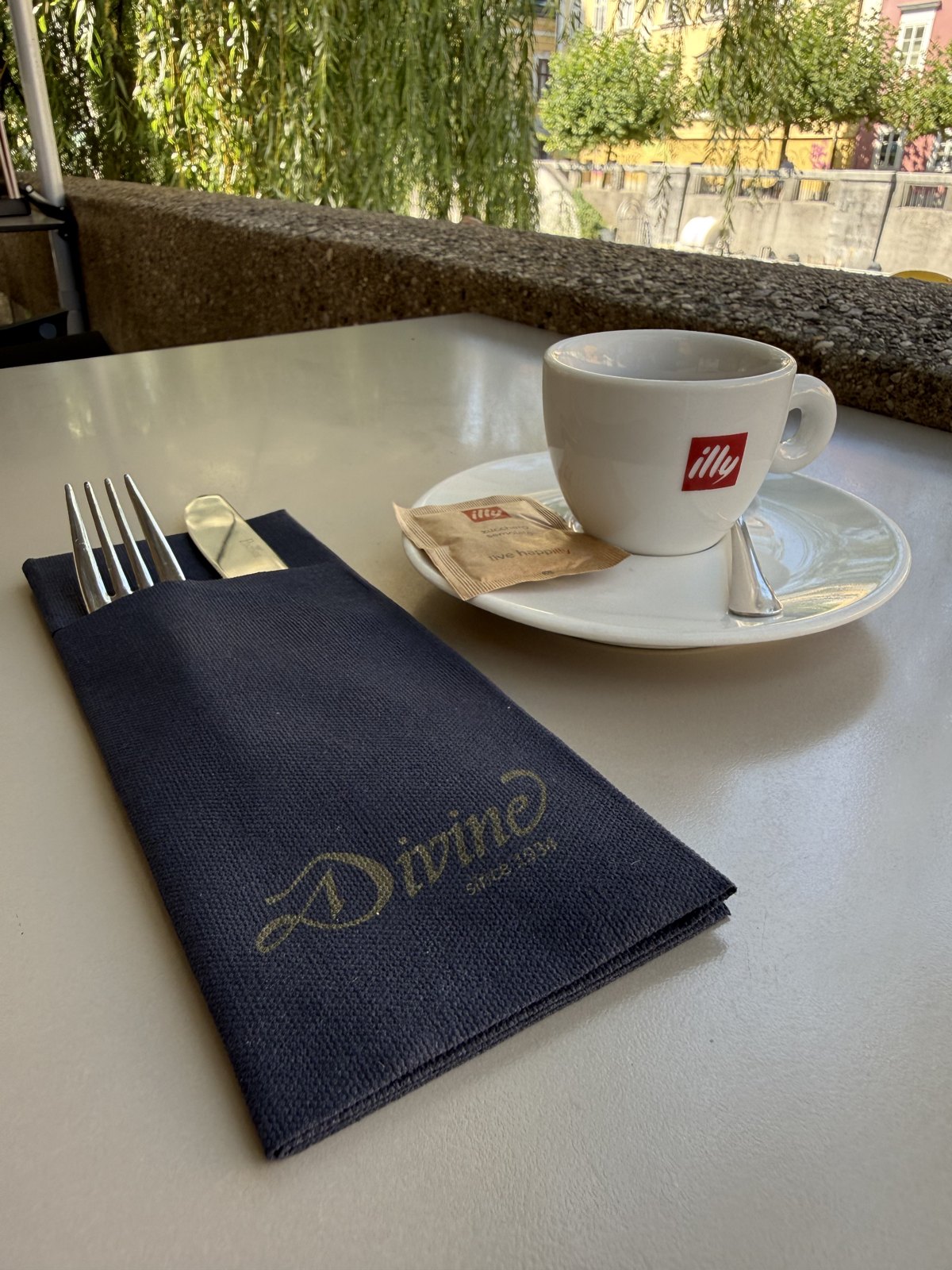 Finished printed napkin with cutlery on a set cafe table
